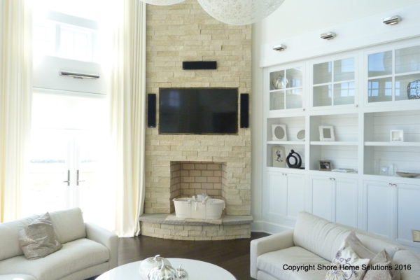 Surround sound system on a brick wall