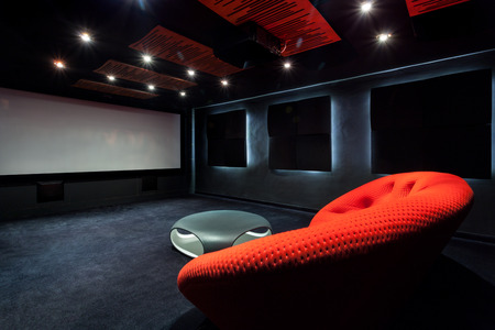 Home Theater Room with Red couch