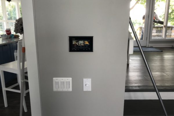 Smart home automation system on a wall of a home
