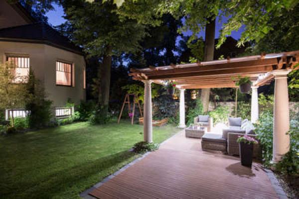 An outdoor patio featuring lighting