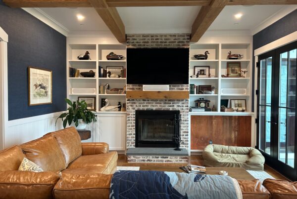 Chester, MD TV above fireplace with front channel speakers