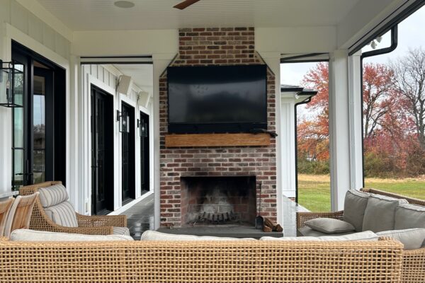 Outdoor TV above fireplace