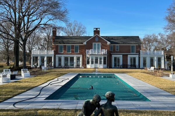 Pool area showing the rear of the home