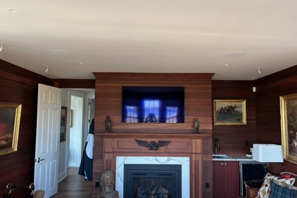 Wall mounted TV over fireplace