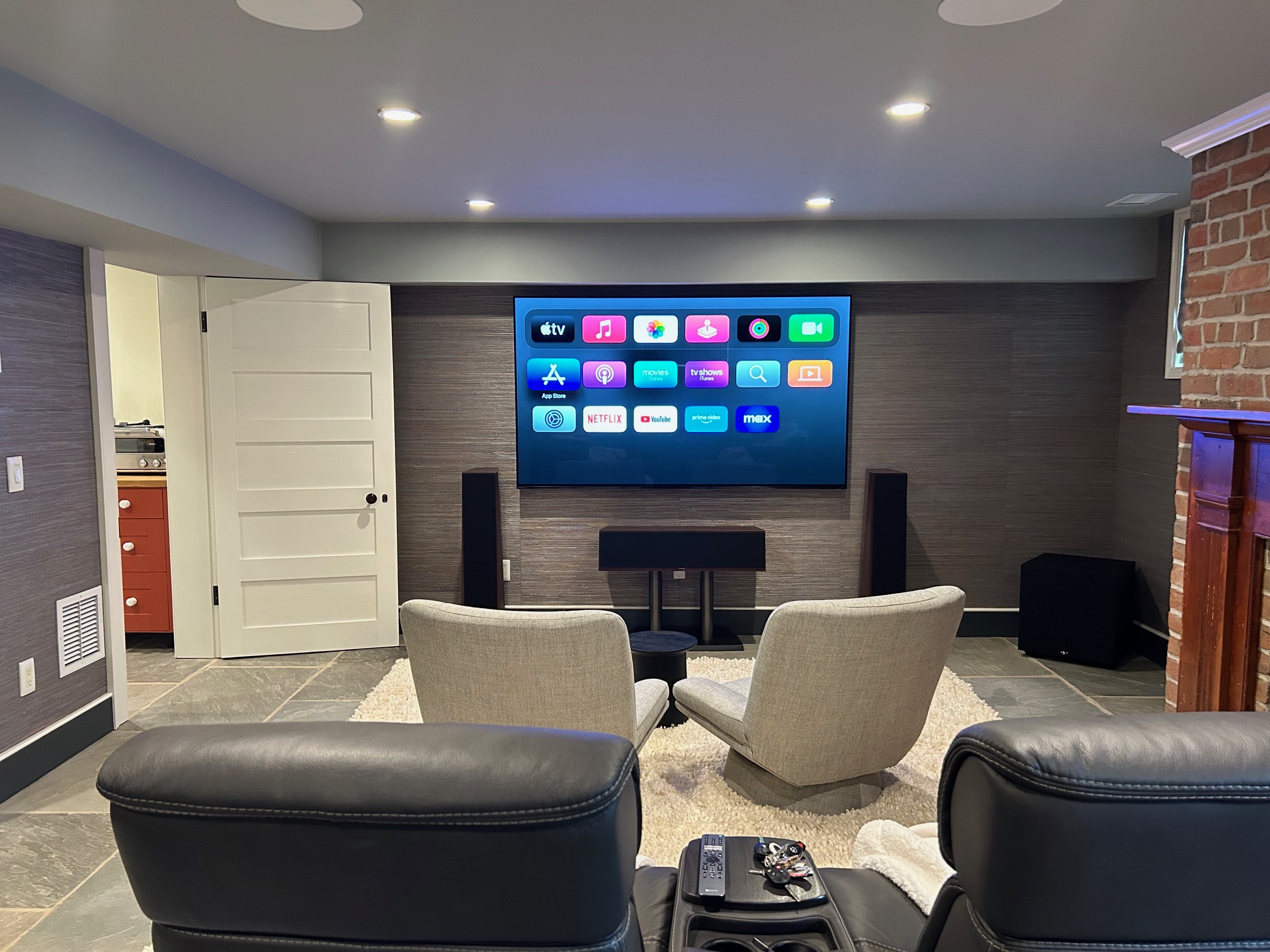 Wall mounted TV and front channel speakers