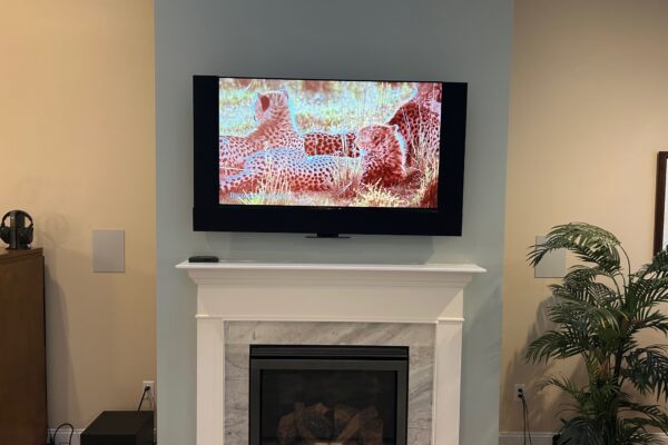 Fireplace mantle mount TV lift up